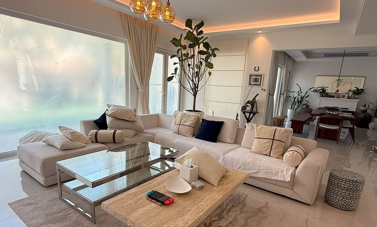 A living room with a couch and coffee table