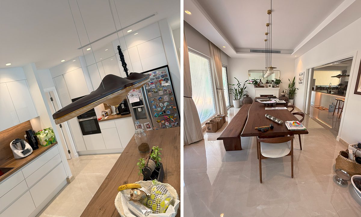 a kitchen and dining room with a table and a chandelier